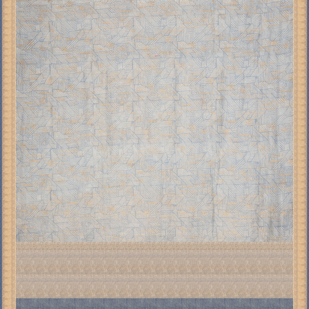 Ice blue Chanderi silk cotton saree with gold zari geometric patterns and embroidered lace border