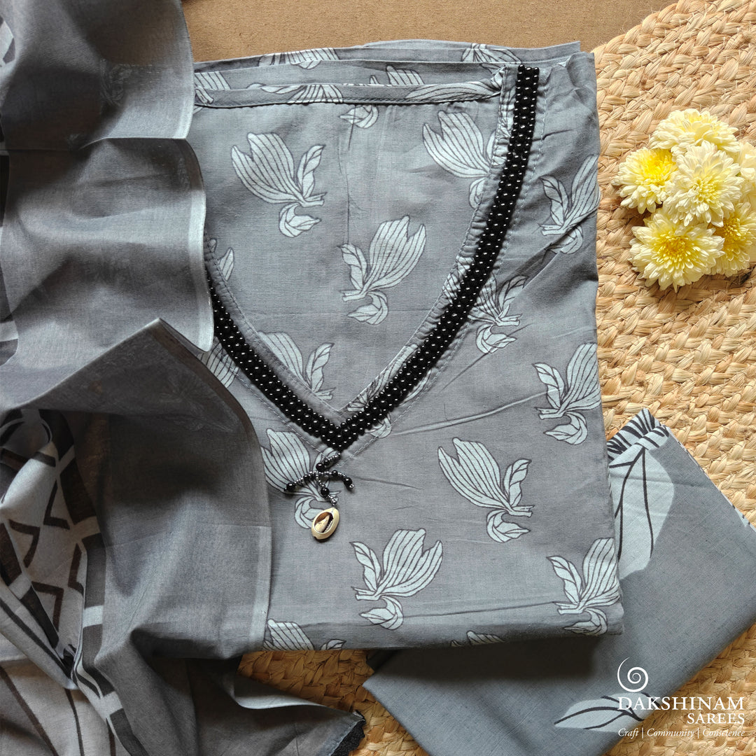 Grey three-piece suit set with black floral buttas, stonework and striped dupatta