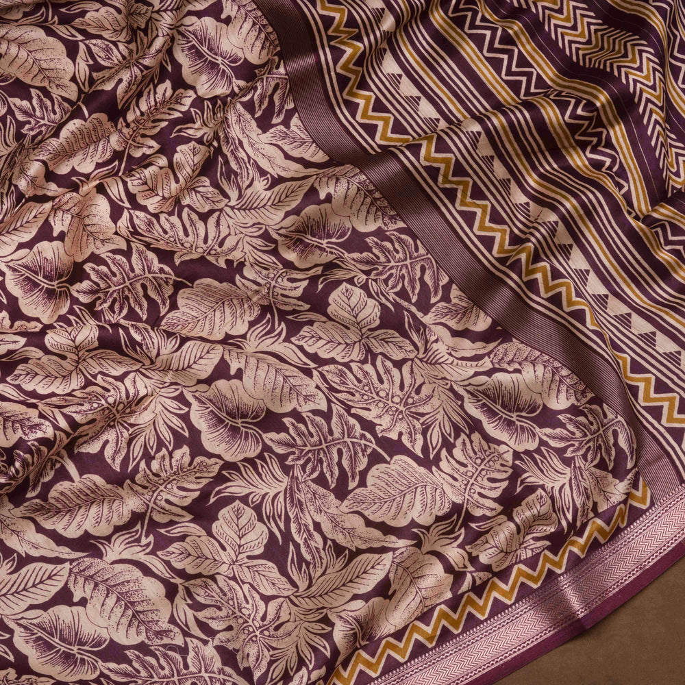 Violet Chanderi silk cotton saree with white leaf print, silver zari border and striped pallu