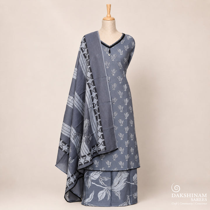 Grey three-piece suit set with black floral buttas, stonework and striped dupatta