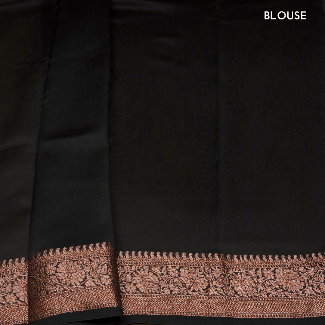 Black Chanderi silk cotton saree with white floral print, gold zari border and striped pallu