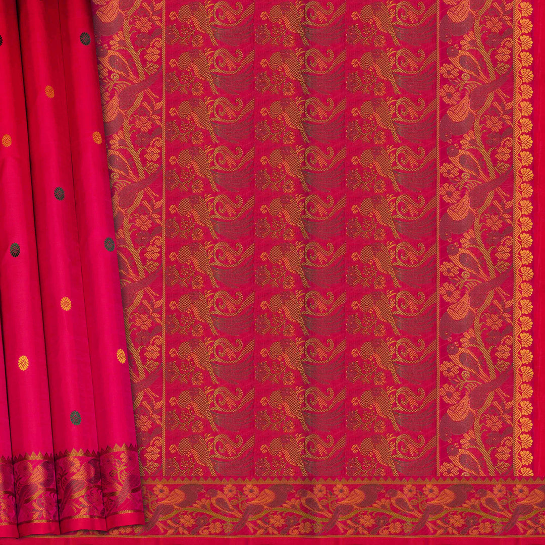 Pink handwoven Kanjivaram silk saree with parrot motifs, temple border and monotone pallu