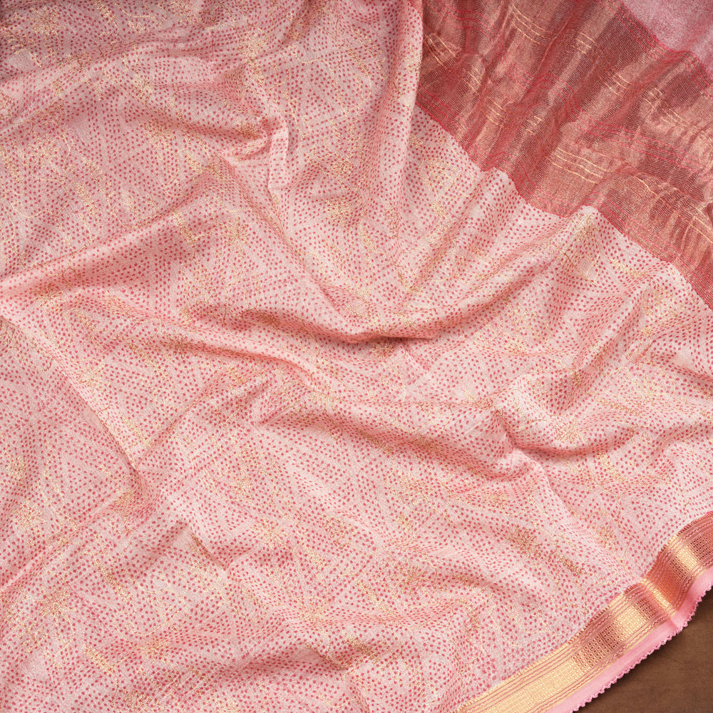 Pink Chanderi silk cotton saree with gold zari dotted triangle motifs and embroidered lace border