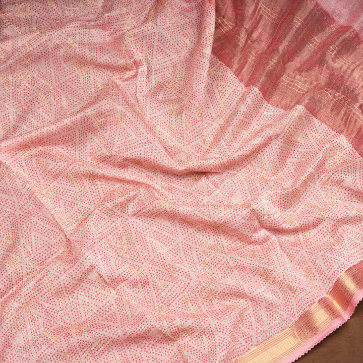 Pink Chanderi silk cotton saree with gold zari dotted triangle motifs and embroidered lace border