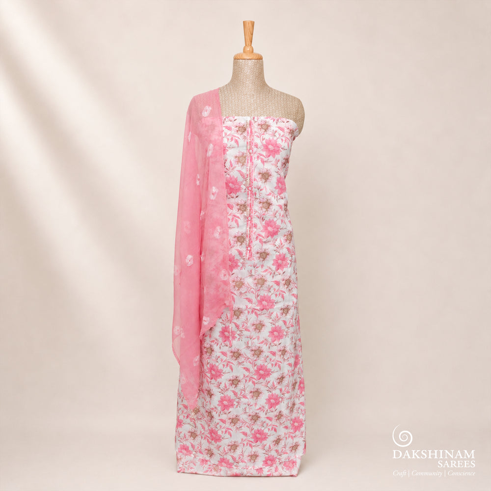 White and pink three-piece suit set with floral design and Bandhani dupatta