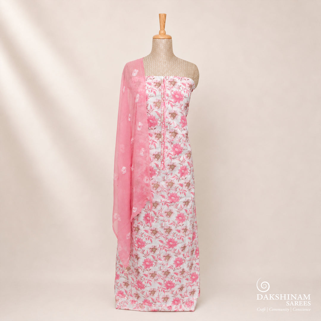White and pink three-piece suit set with floral design and Bandhani dupatta