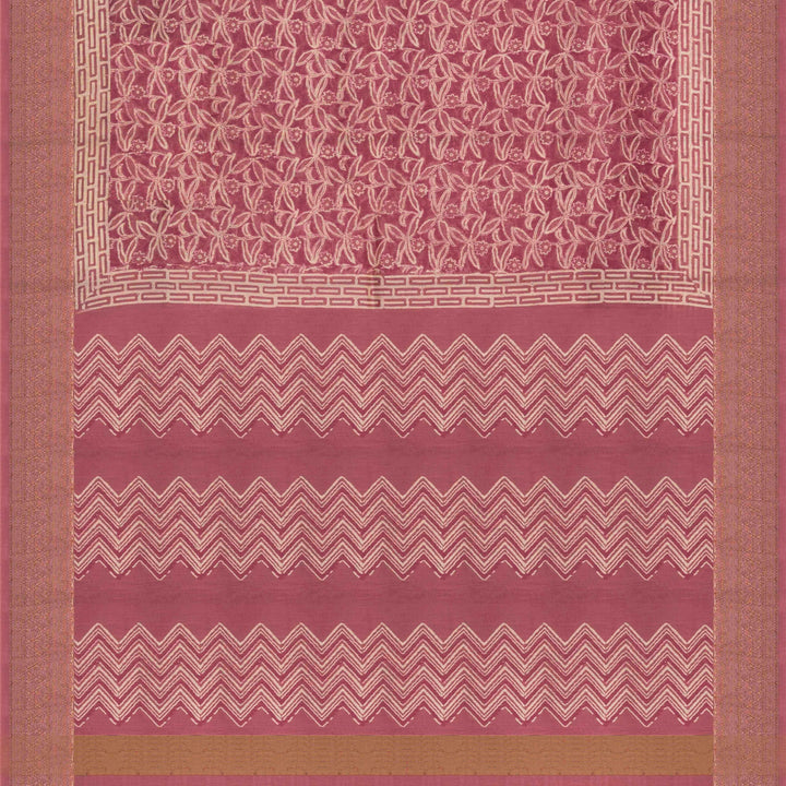 Pink Chanderi silk cotton saree with white floral print, gold zari border and striped pallu