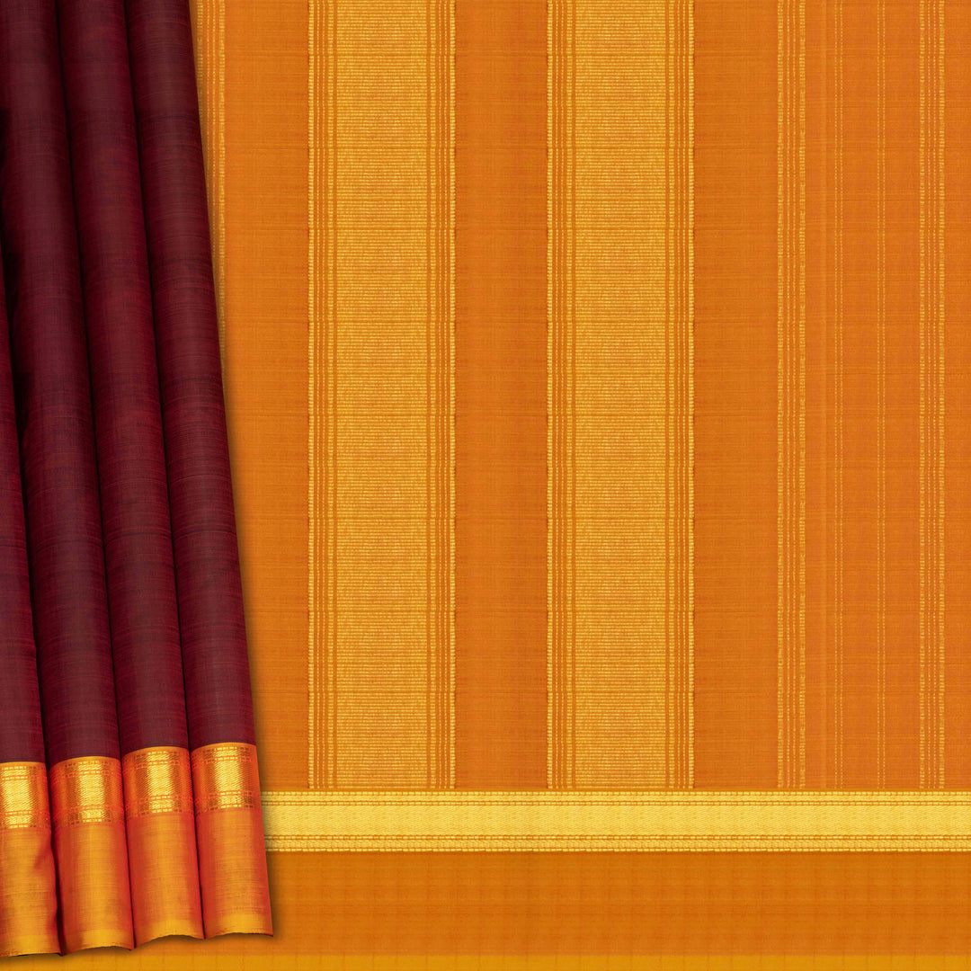 Maroon handwoven Kanjivaram silk saree with mango yellow border, gold zari and contrast pallu