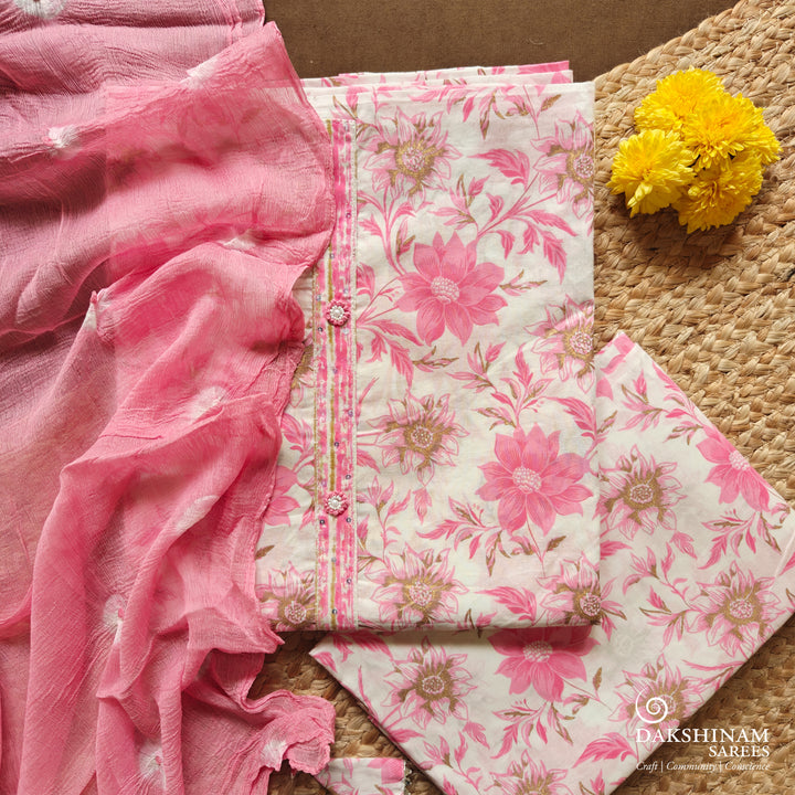 White and pink three-piece suit set with floral design and Bandhani dupatta
