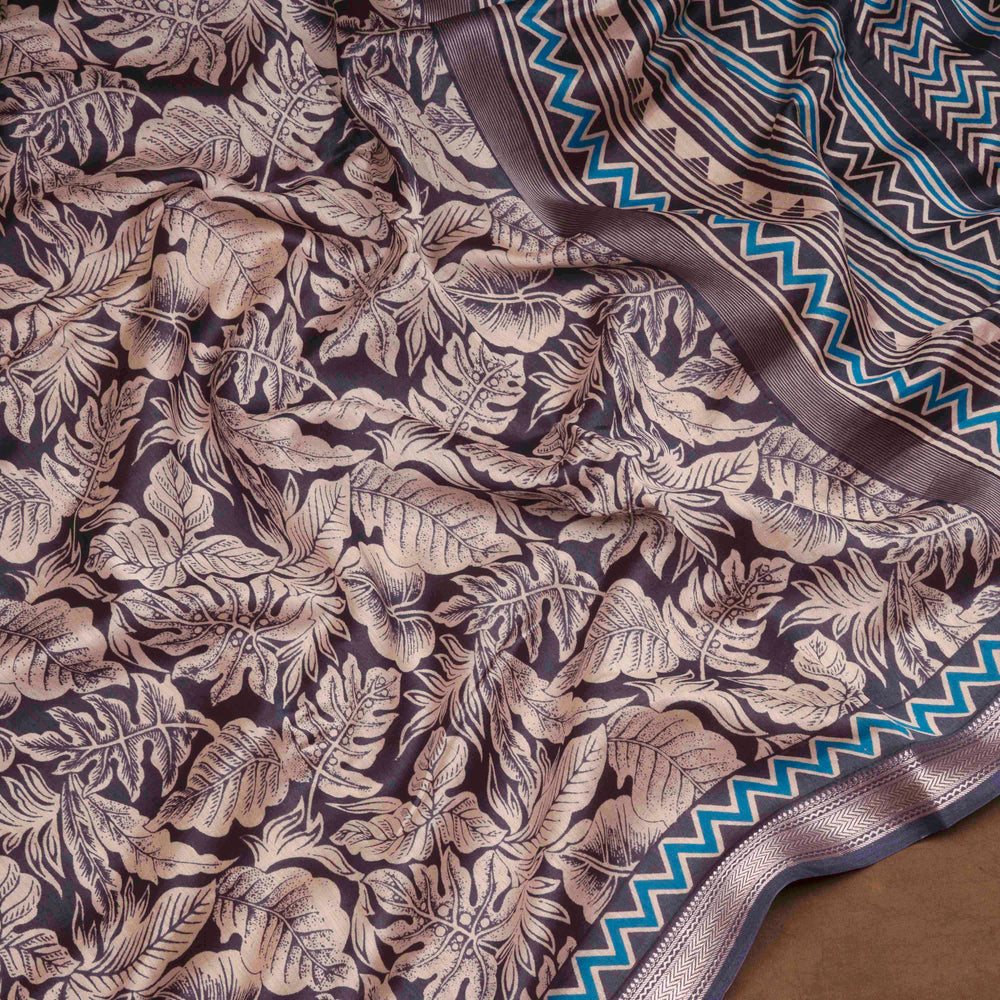 Dark blue Chanderi silk cotton saree with white leaf print, silver zari border and striped pallu