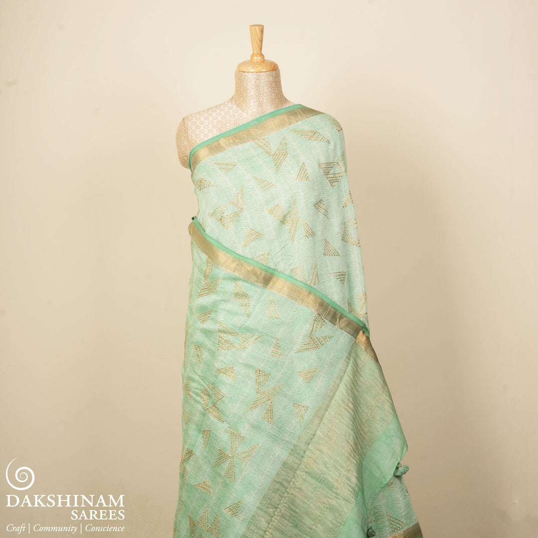 Green Chanderi silk cotton saree with gold zari geometric patterns and embroidered lace border