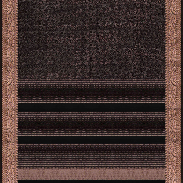 Black Chanderi silk cotton saree with white floral print, gold zari border and striped pallu