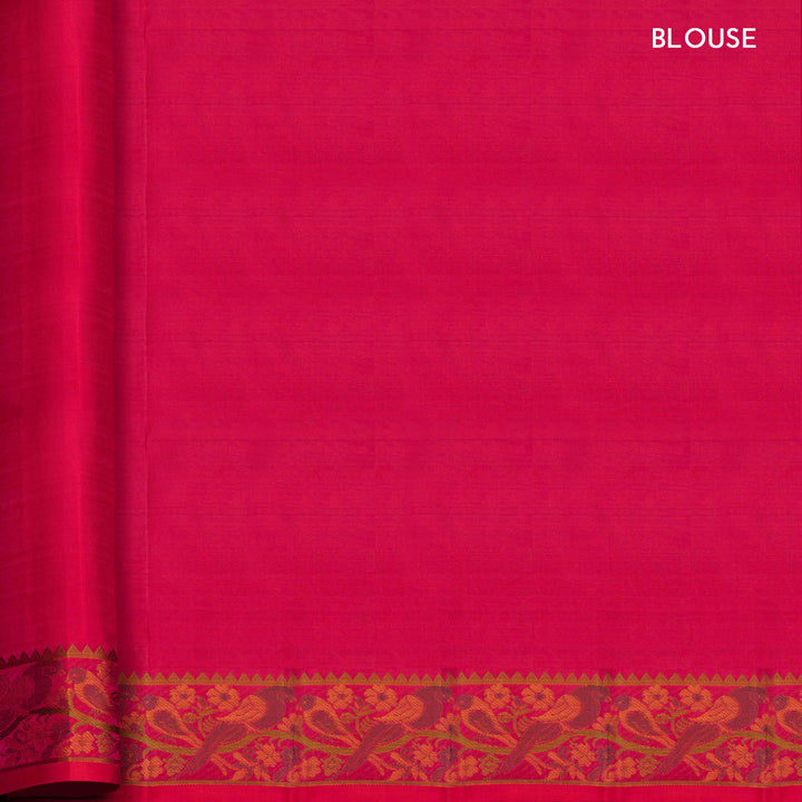 Pink handwoven Kanjivaram silk saree with parrot motifs, temple border and monotone pallu