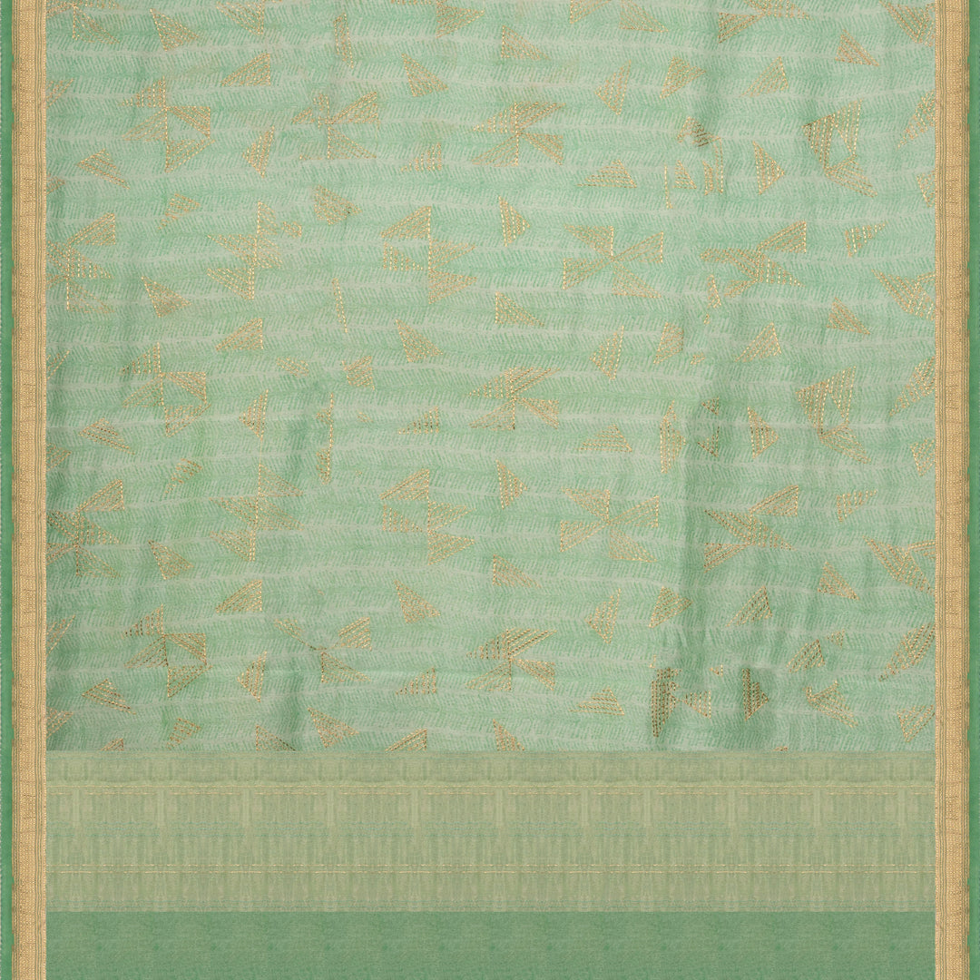 Green Chanderi silk cotton saree with gold zari geometric patterns and embroidered lace border